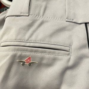 Grey baseball pants with black stripe. Elastic in bottoms